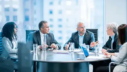 Financial services team reviewing credit decisioning workflows